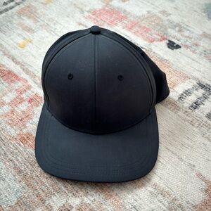 LuluLemon flat bill black hat.  Design under bill